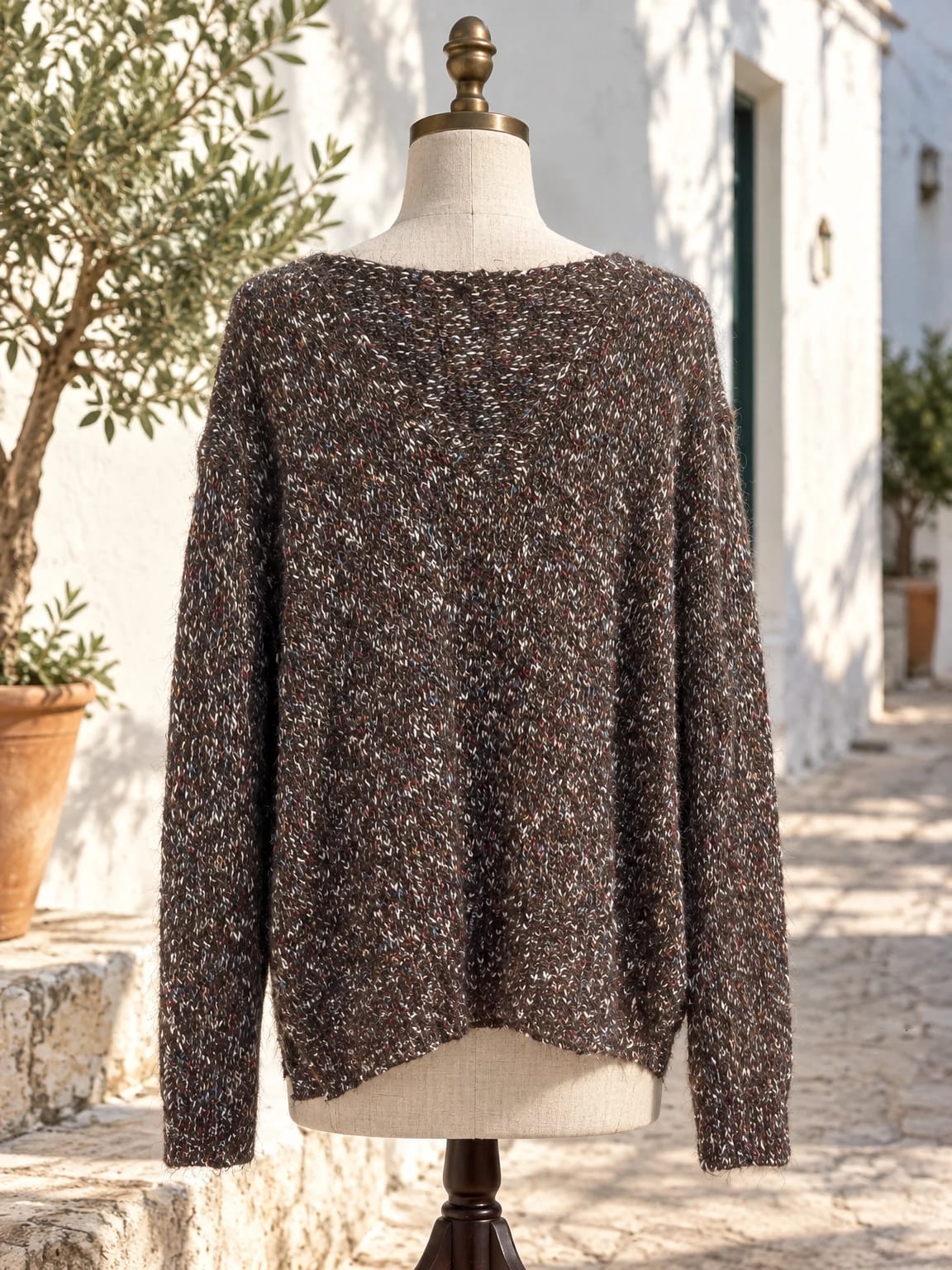 Maglia lunga con fondo asimmetrico