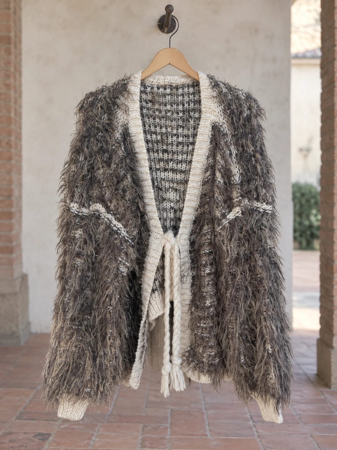 Cardigan lungo in maglia sfrangiata