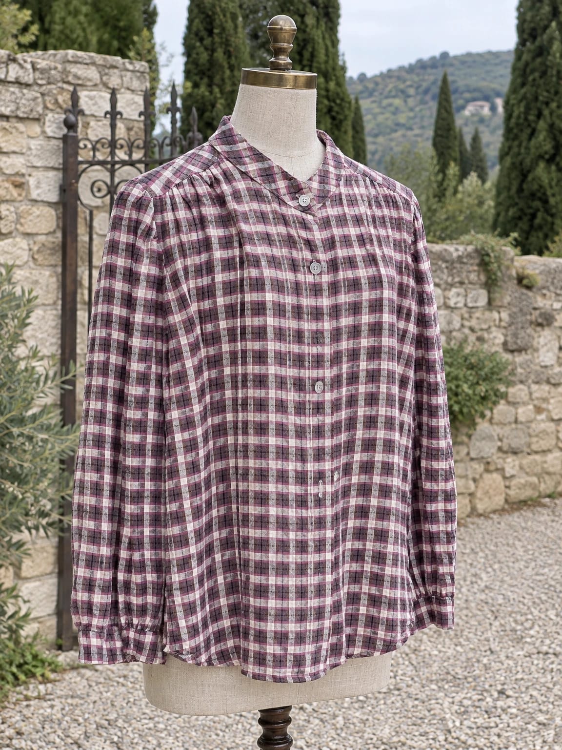 Blusa a quadri con collo alto